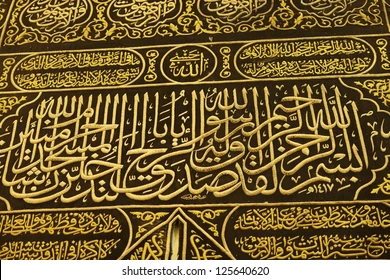 Gold ornament on black silk